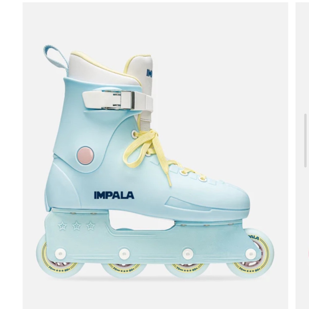 ROLLER SKATES - never worn outdoors - almost perfect condition